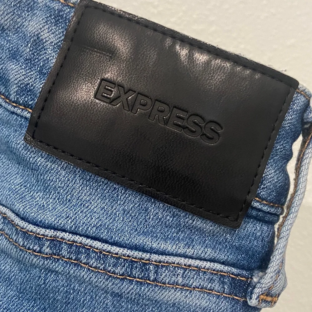 Express Distressed Blue Skinny Jeans. Size 38x 32